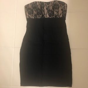 Black cocktail dress with lace detail